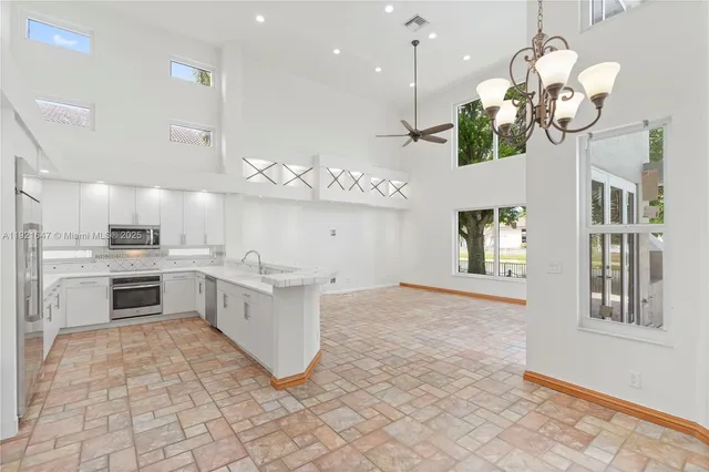 an aerial view of house with outdoor space