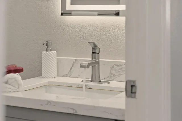 a bathroom with a sink and a toilet