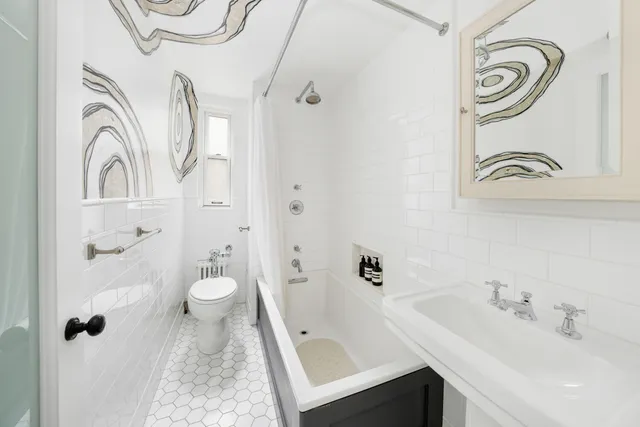 a living room with furniture wooden floor and a table