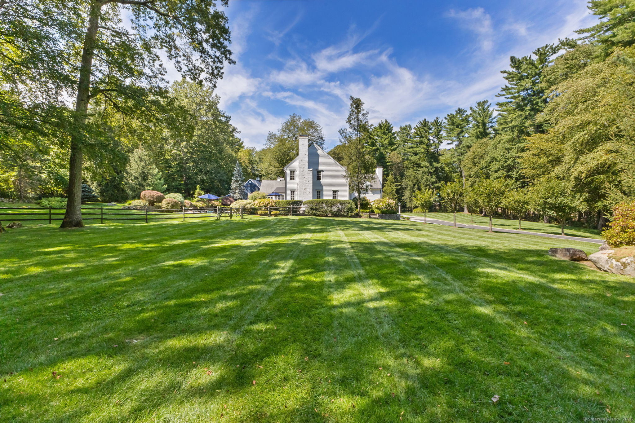 245 Benedict Hill Road New Canaan, CT 06840 - Photo 12 of 49 a big yard with large trees