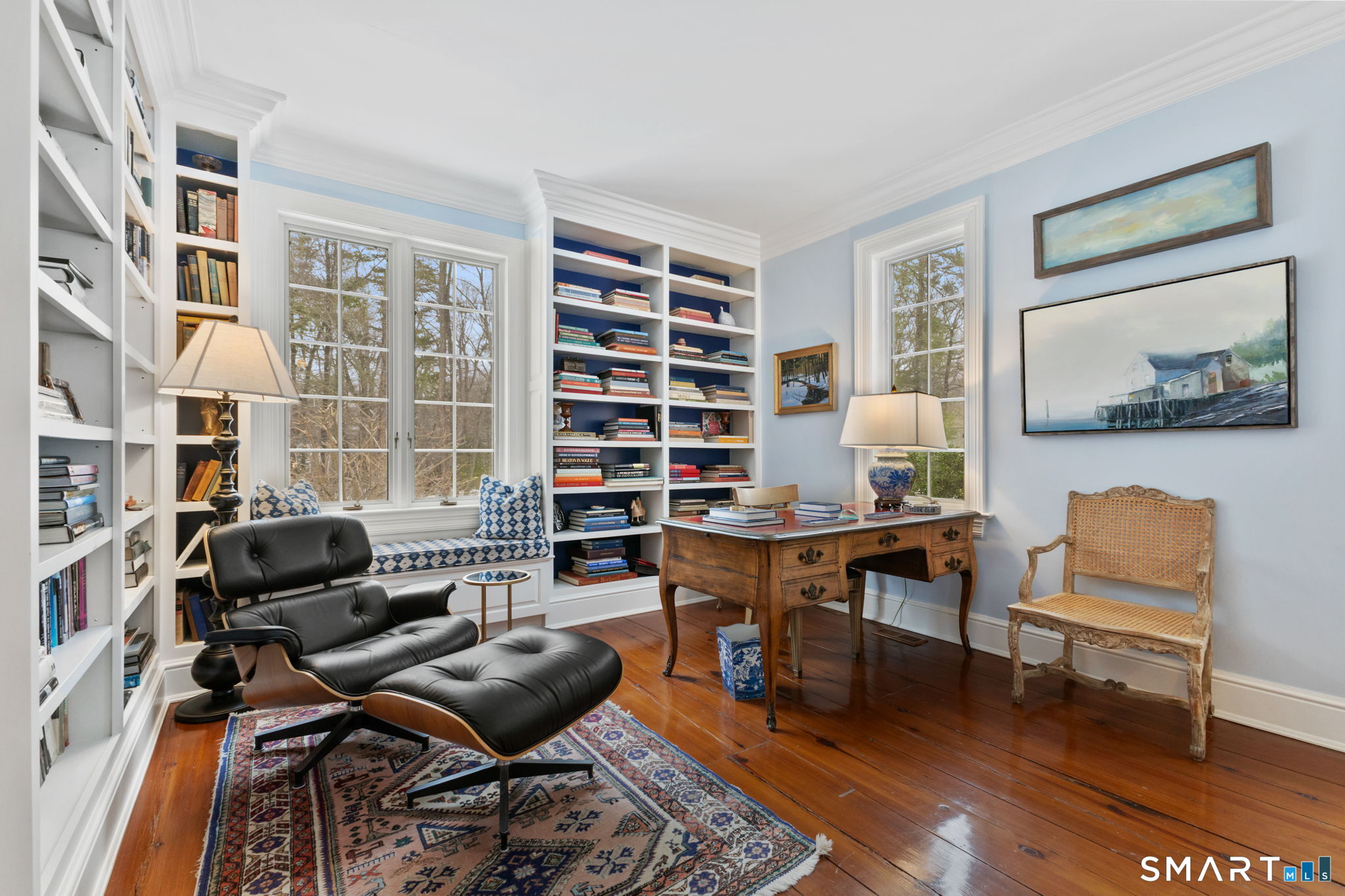 245 Benedict Hill Road New Canaan, CT 06840 - Photo 16 of 49 a view of a livingroom with workspace and a couch