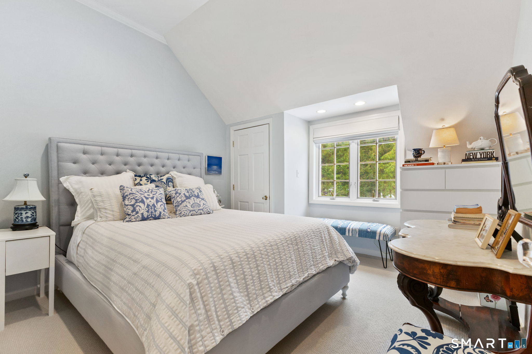 245 Benedict Hill Road New Canaan, CT 06840 - Photo 28 of 49 a bedroom with bed and a large window