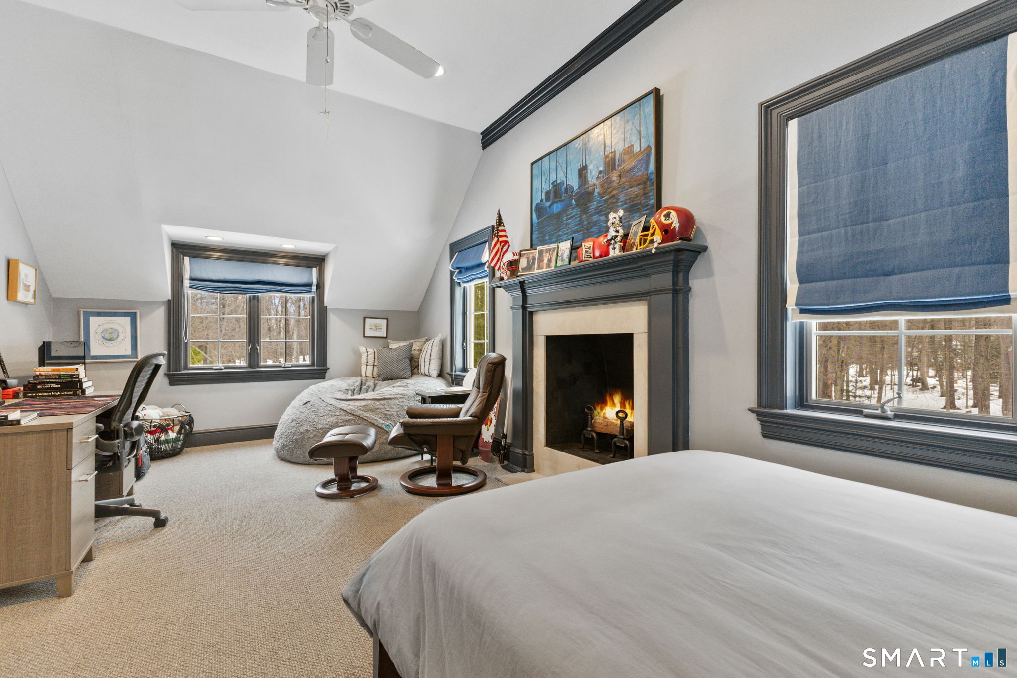 245 Benedict Hill Road New Canaan, CT 06840 - Photo 30 of 49 a bedroom with furniture a fireplace and a window