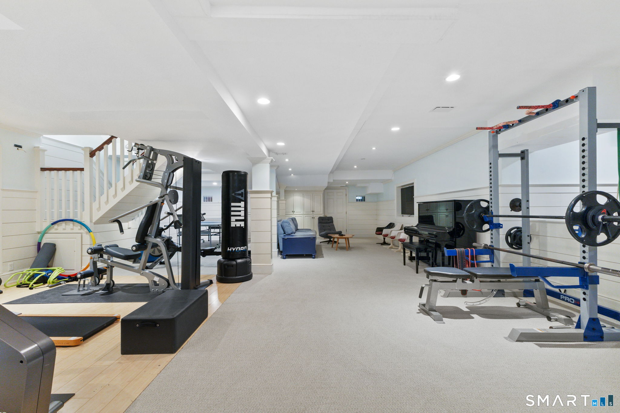 245 Benedict Hill Road New Canaan, CT 06840 - Photo 38 of 49 a view of a room with gym equipment