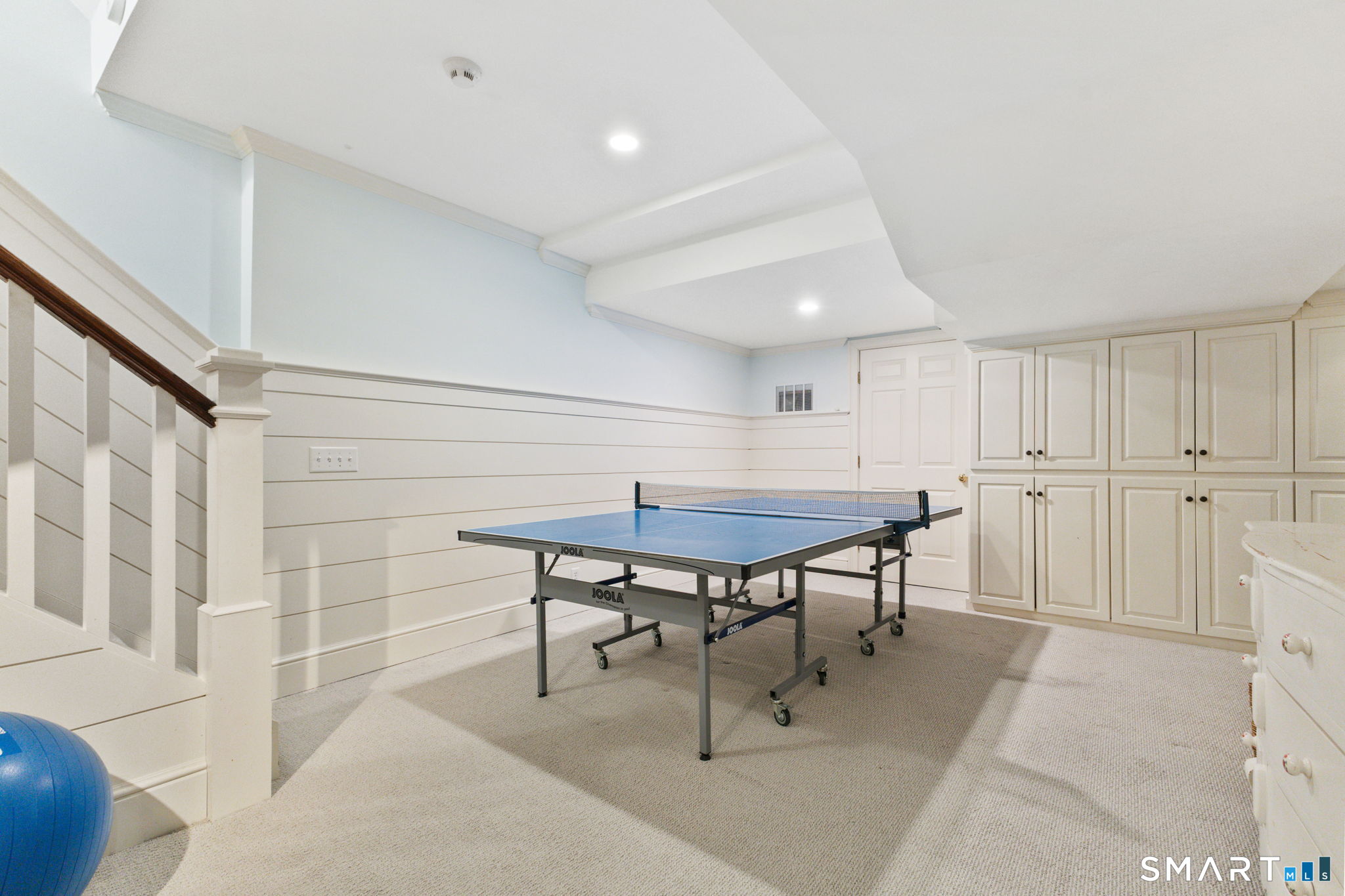 245 Benedict Hill Road New Canaan, CT 06840 - Photo 39 of 49 a view of a livingroom with furniture and wooden floor