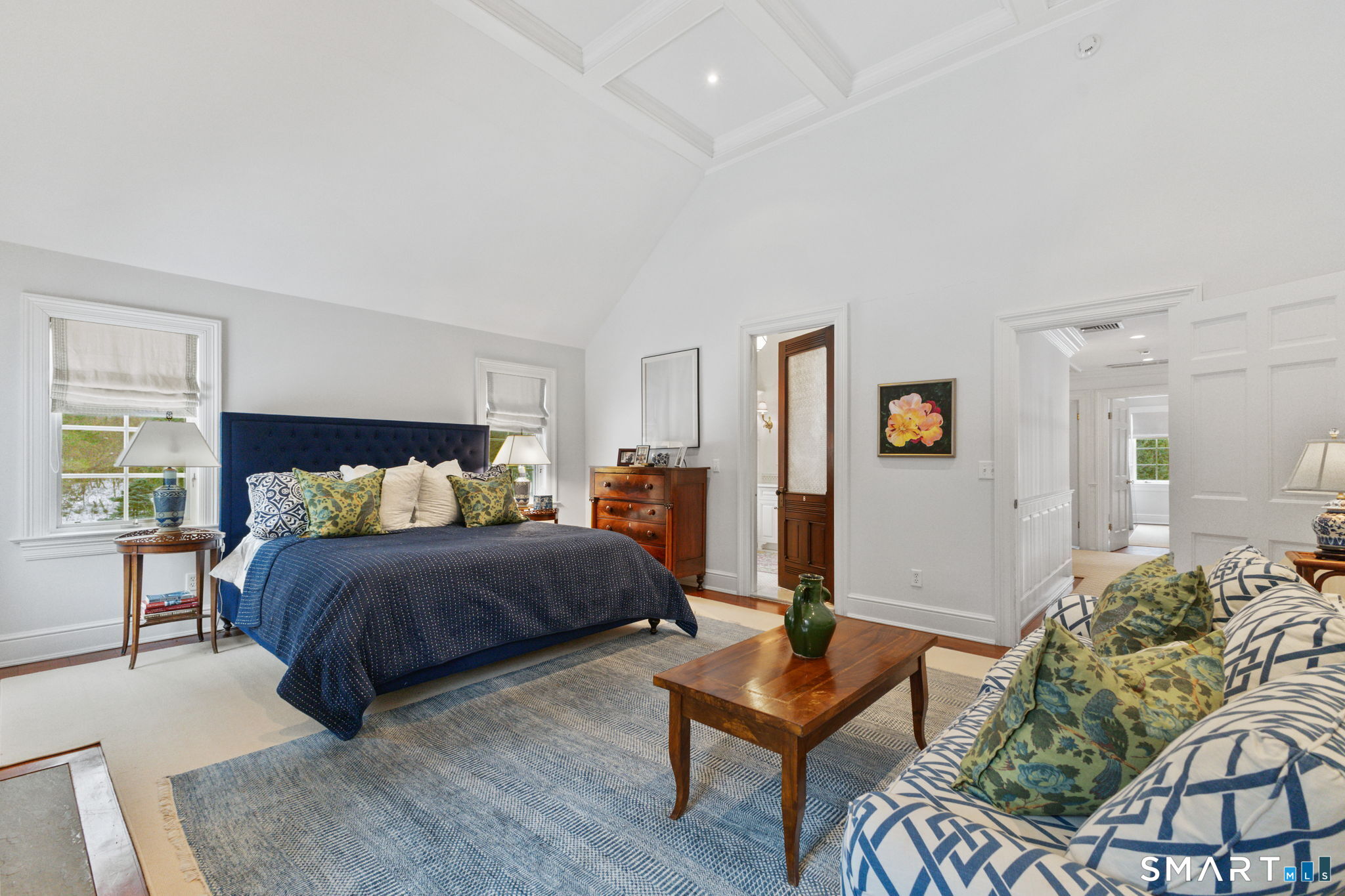 245 Benedict Hill Road New Canaan, CT 06840 - Photo 43 of 49 a bedroom with a bed table and a couch