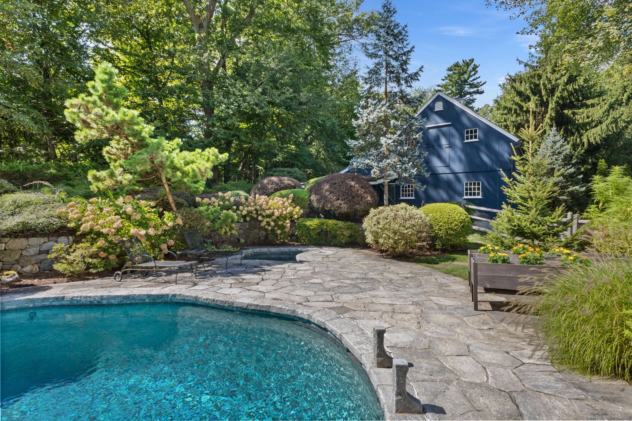245 Benedict Hill Road New Canaan, CT 06840 - Photo 7 of 49 a backyard of a house with lots of green space