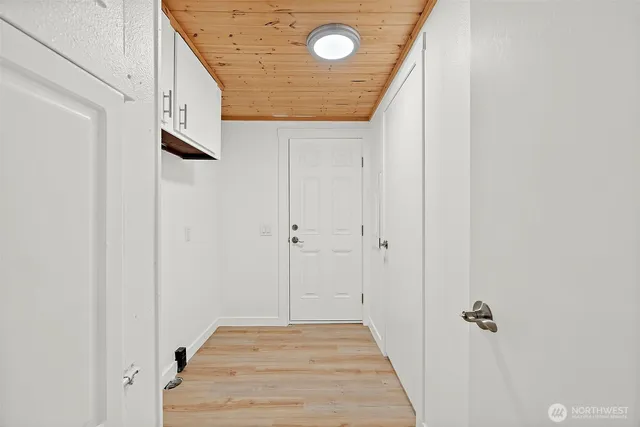 a bathroom with a granite countertop bathtub and a sink