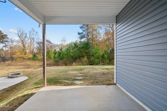 a view of a backyard of a house