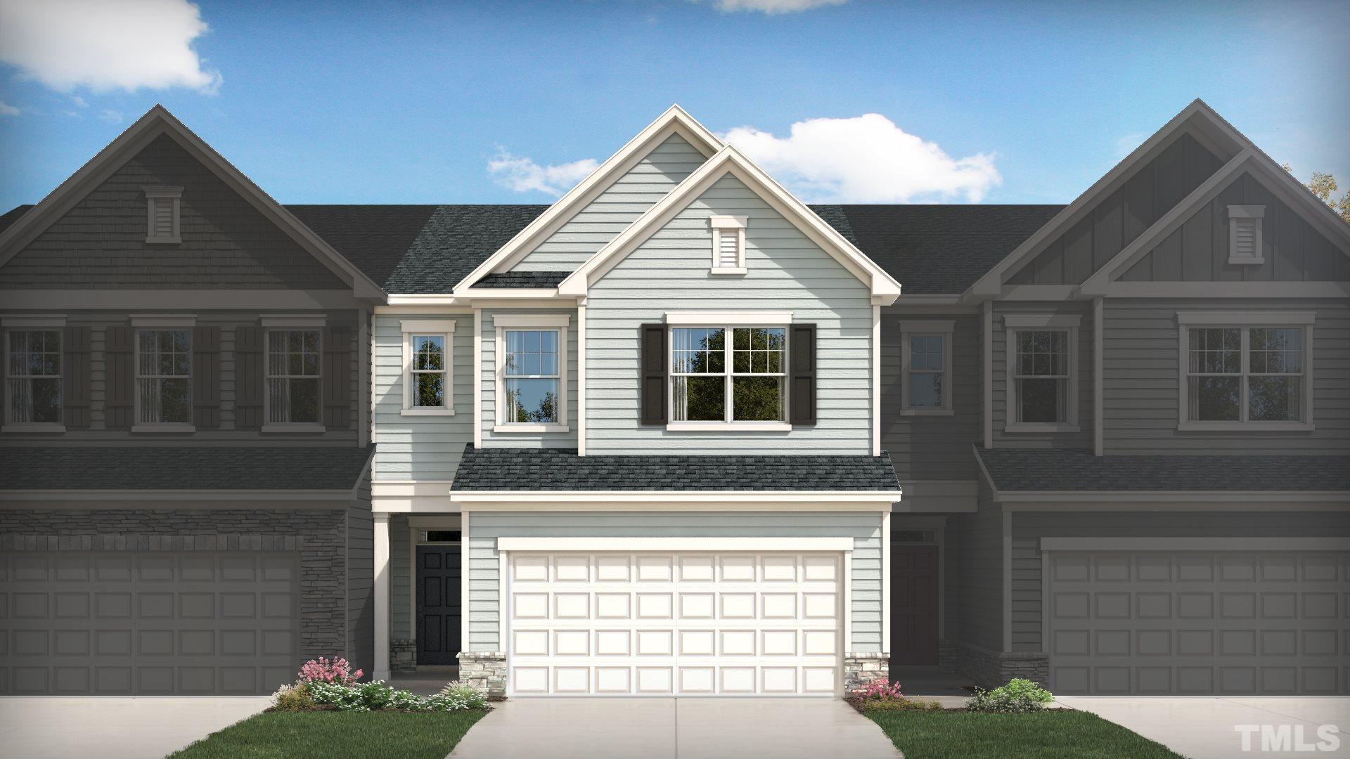 6527 Mezzo Lane Raleigh, NC 27616 - Photo 1 of 1 a front view of a house with a yard