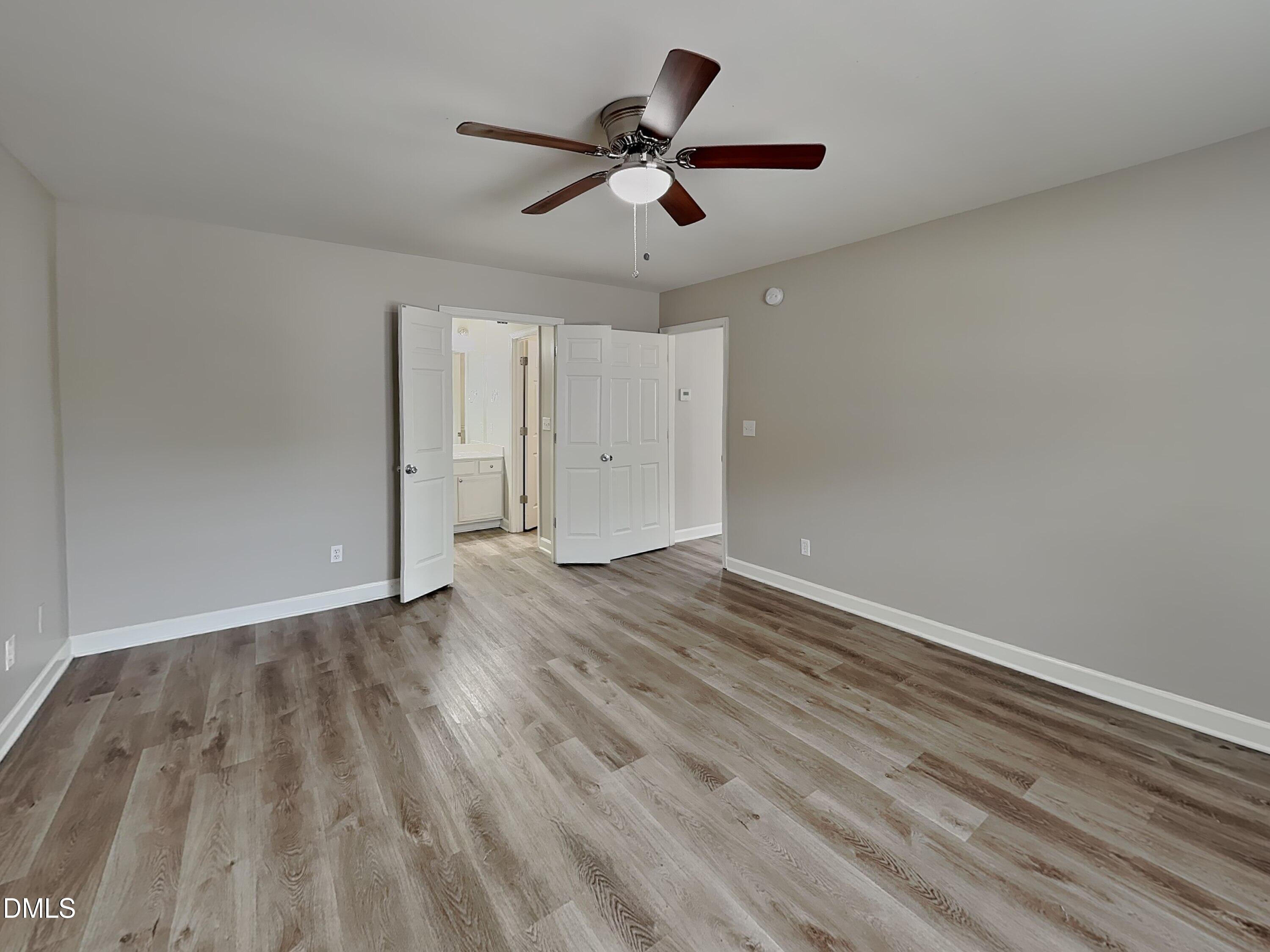 3224 Cotton Grove Raleigh, NC 27610 - Photo 6 of 15 wooden floor in an empty room