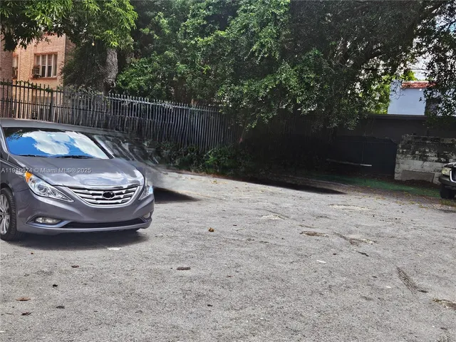 a view of backyard with trees