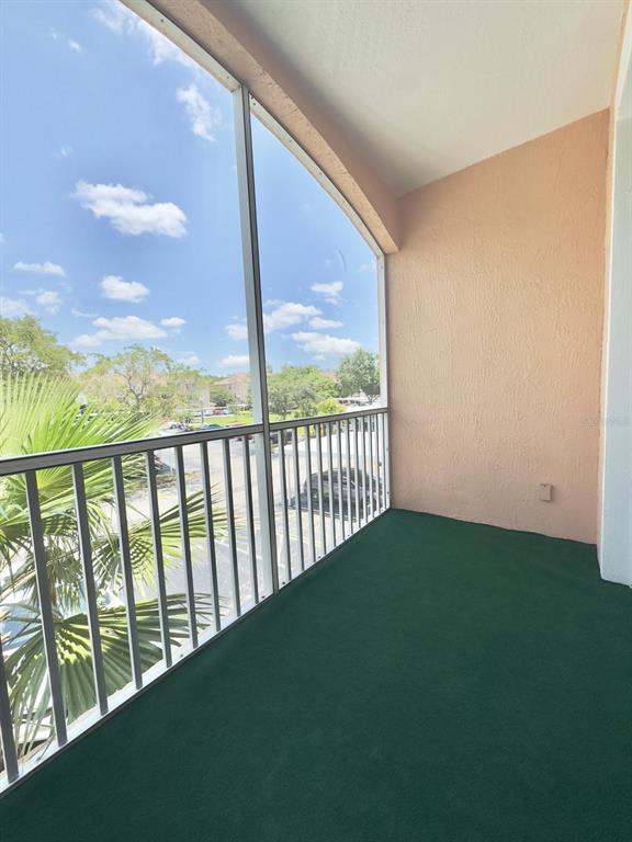 13512 Turtle Marsh Loop, Unit 729 Orlando, FL 32837 - Photo 20 of 42 a view of balcony with furniture
