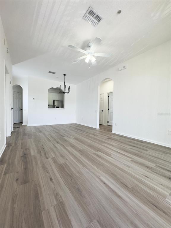 13512 Turtle Marsh Loop, Unit 729 Orlando, FL 32837 - Photo 25 of 42 a view of a livingroom with wooden floor