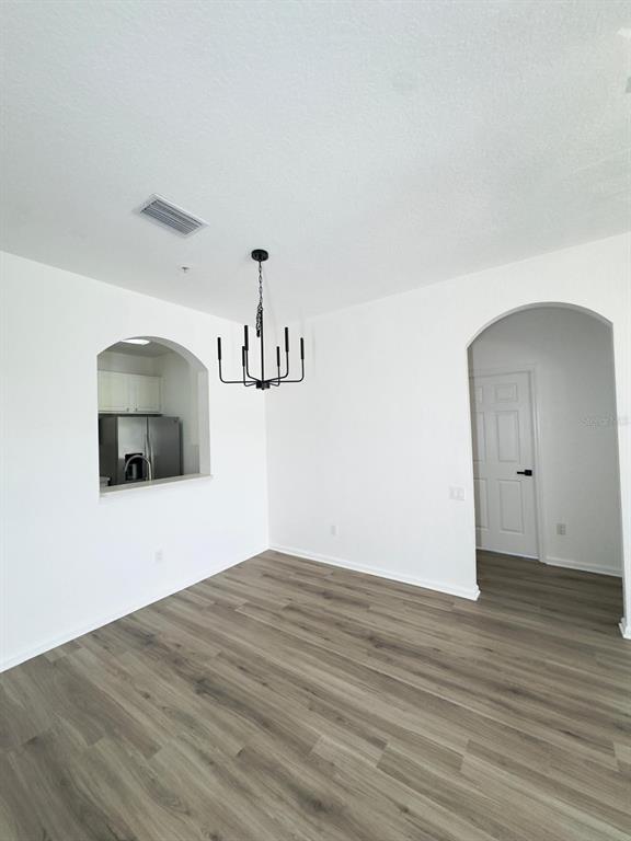13512 Turtle Marsh Loop, Unit 729 Orlando, FL 32837 - Photo 35 of 42 a view of a livingroom with wooden floor
