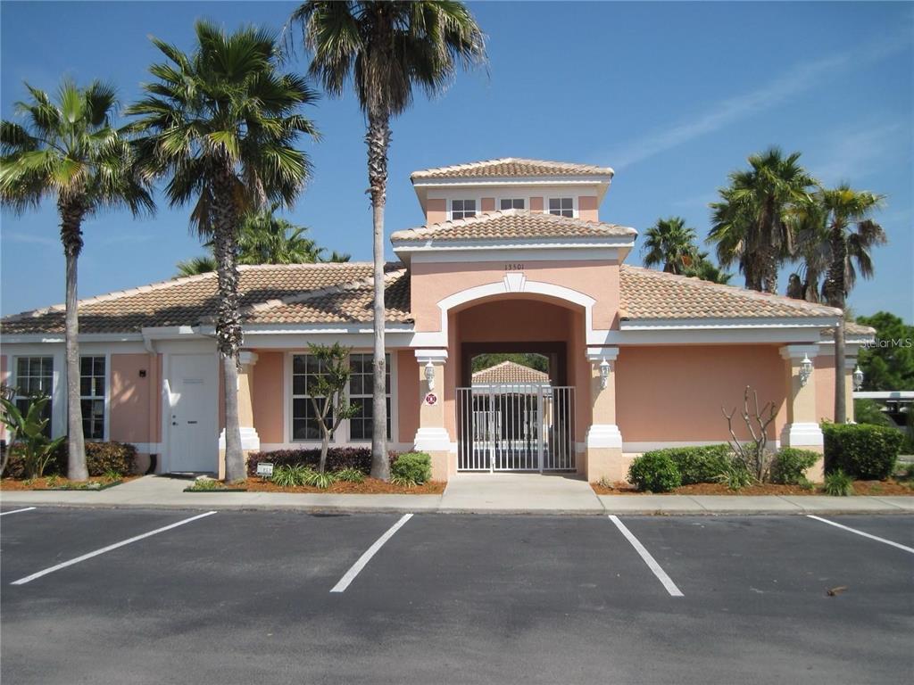 13512 Turtle Marsh Loop, Unit 729 Orlando, FL 32837 - Photo 5 of 42 front view of a house with a palm tree