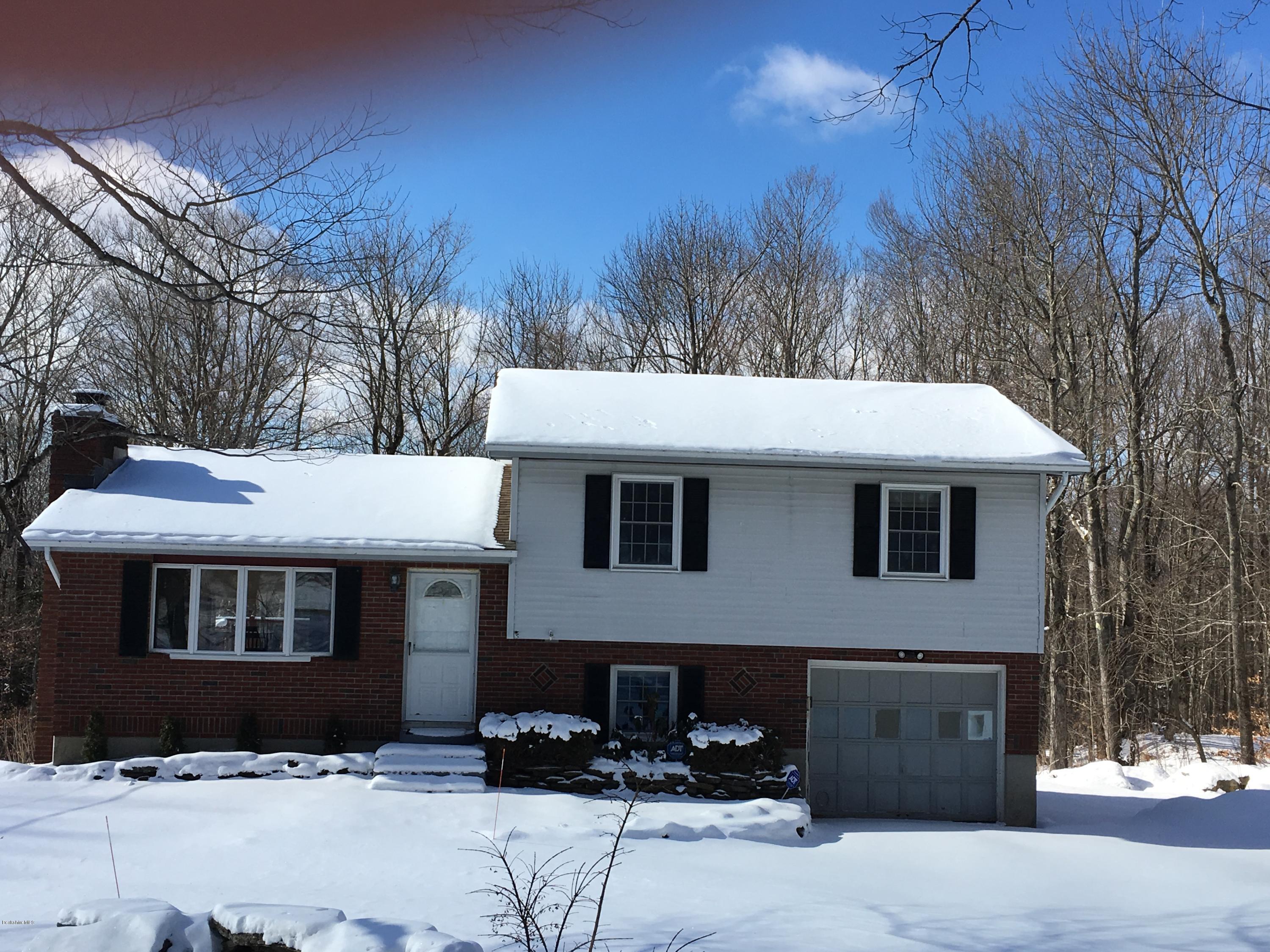 13 August Smith Road Peru, MA 01235 - Photo 16 of 20 a front view of a house with a yard