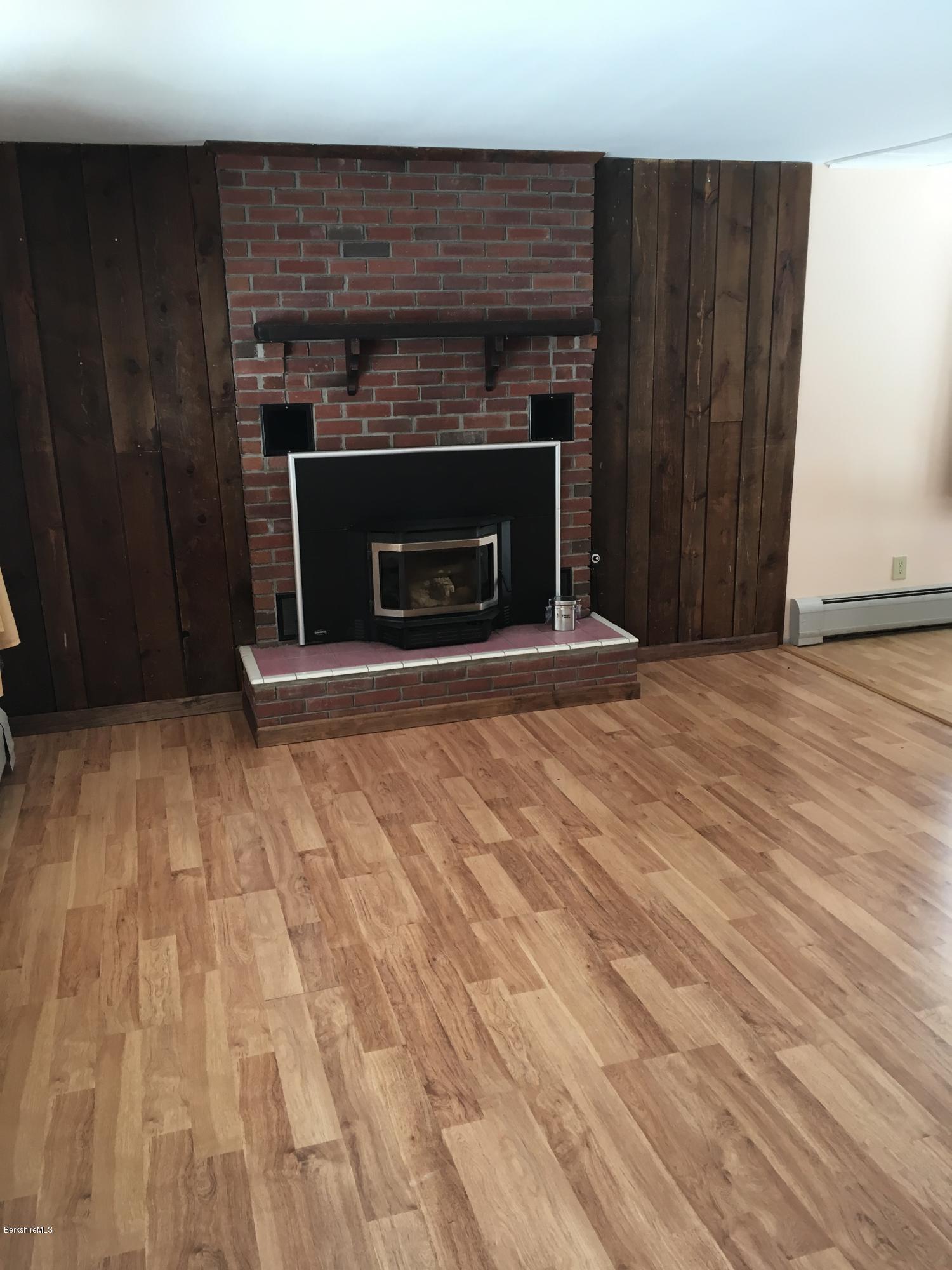 13 August Smith Road Peru, MA 01235 - Photo 19 of 20 a living room with a fireplace