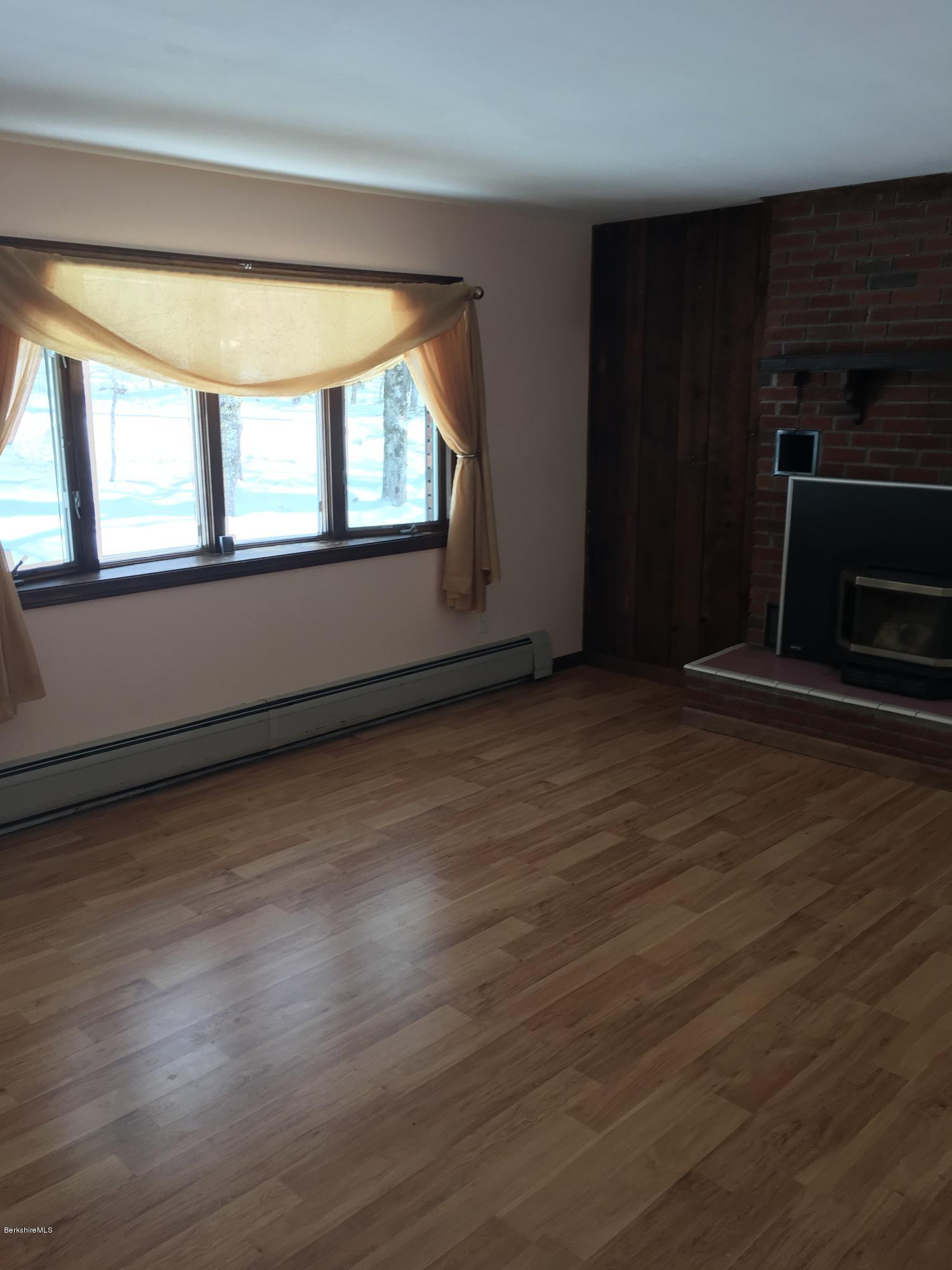 13 August Smith Road Peru, MA 01235 - Photo 20 of 20 an empty room with wooden floor and windows
