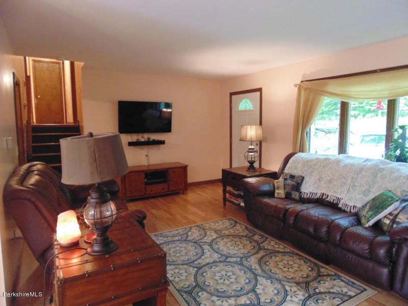 13 August Smith Road Peru, MA 01235 - Photo 9 of 20 a living room with furniture and a flat screen tv