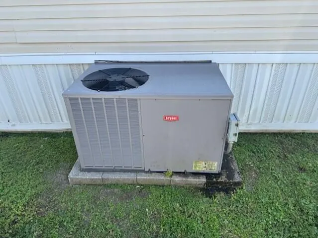 a kitchen with a refrigerator and a sink