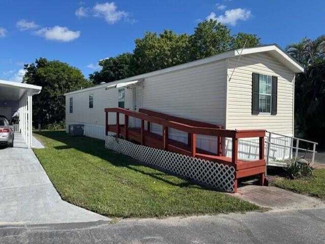 2990 Southwest 53rd Avenue Davie, FL 33314 - Photo 5 of 30 front view of a house with a yard
