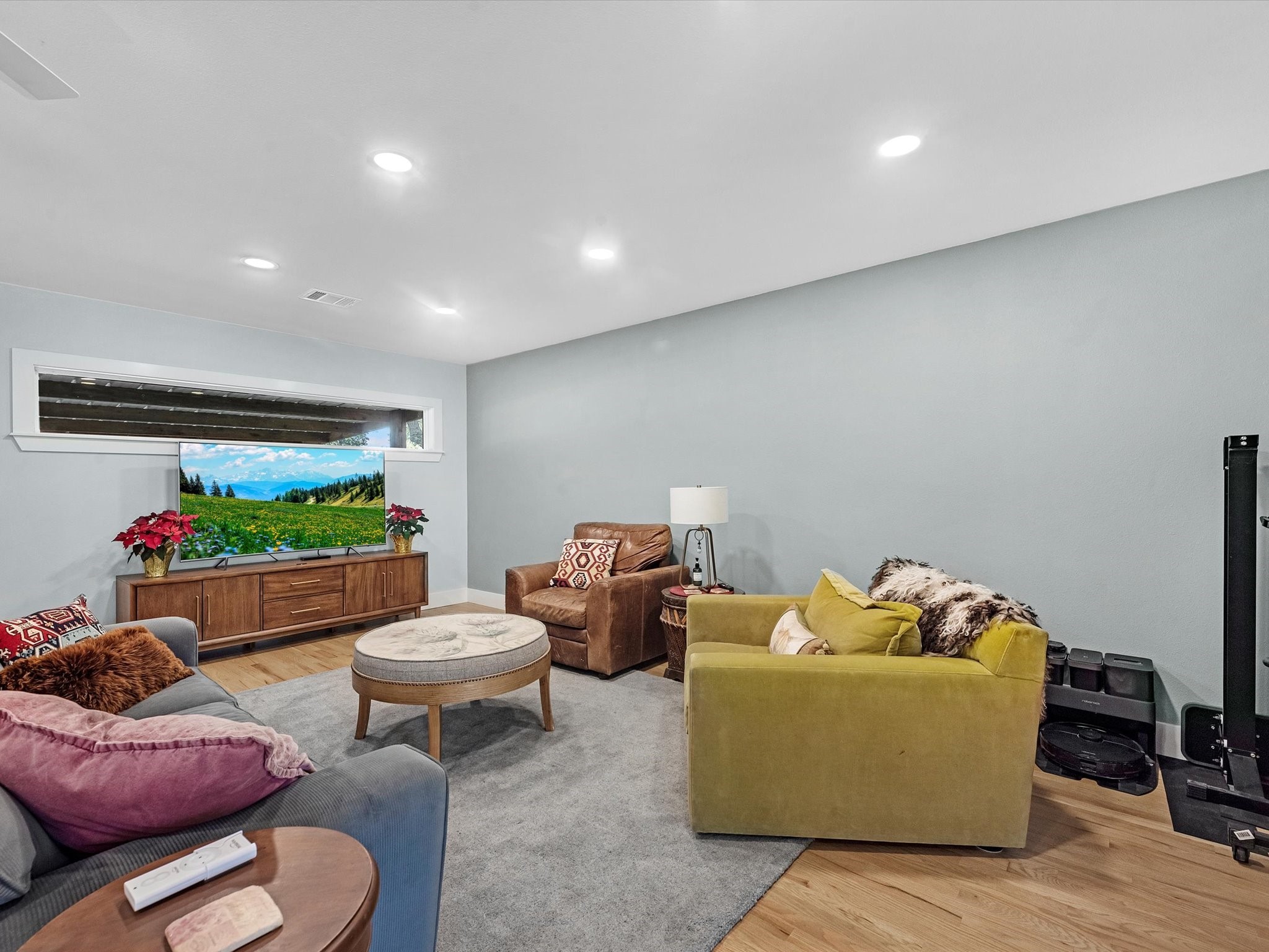 712 Barbara Street Tomball, TX 77375 - Photo 14 of 25 a living room with furniture and a flat screen tv