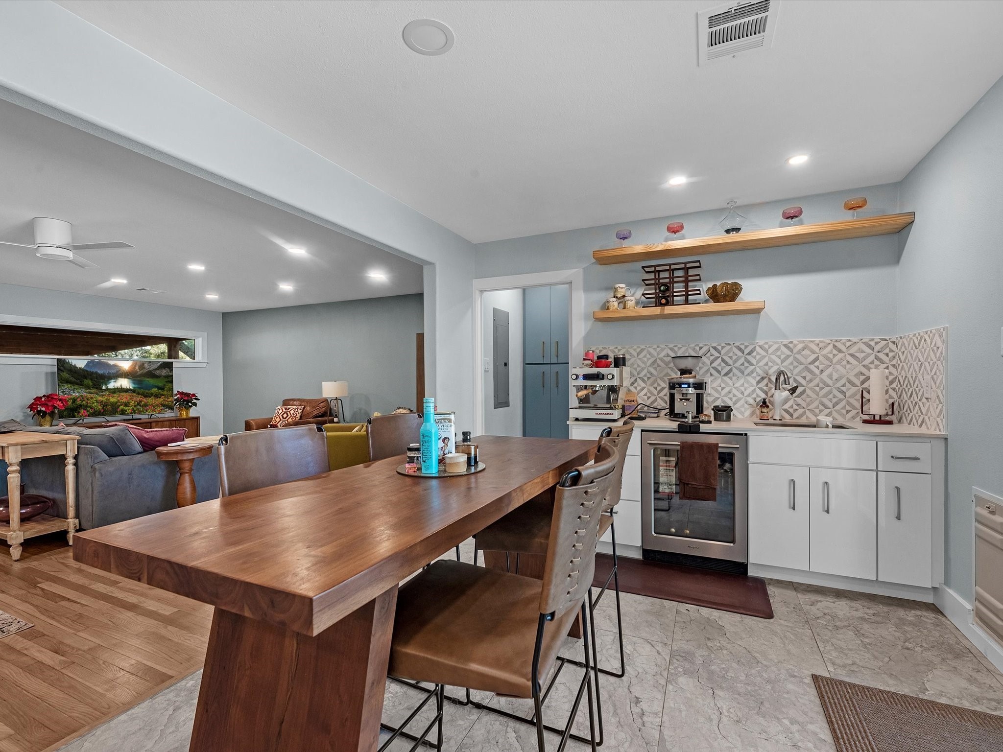 712 Barbara Street Tomball, TX 77375 - Photo 10 of 25 a kitchen with kitchen island granite countertop a sink and counter space