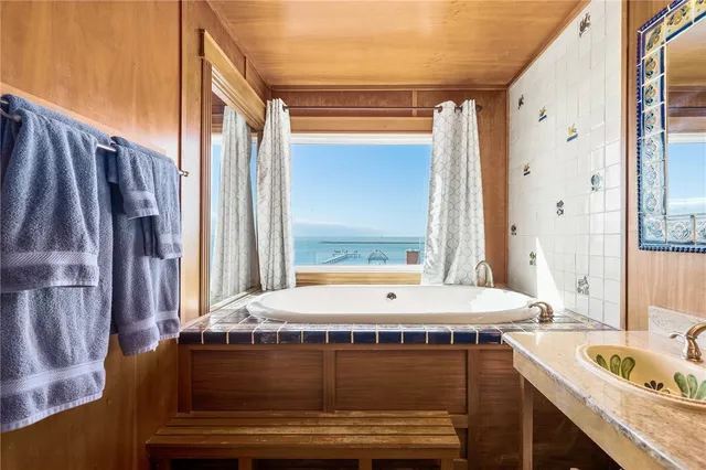 a bed room with a bed and a dresser