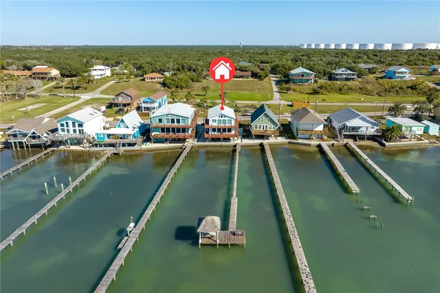 a view of swimming pool with chairs