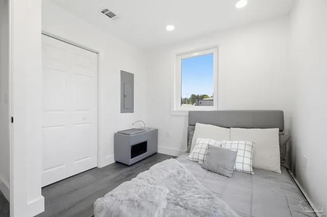 a bathroom with a sink and mirror