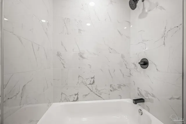 a view of a room that has a window