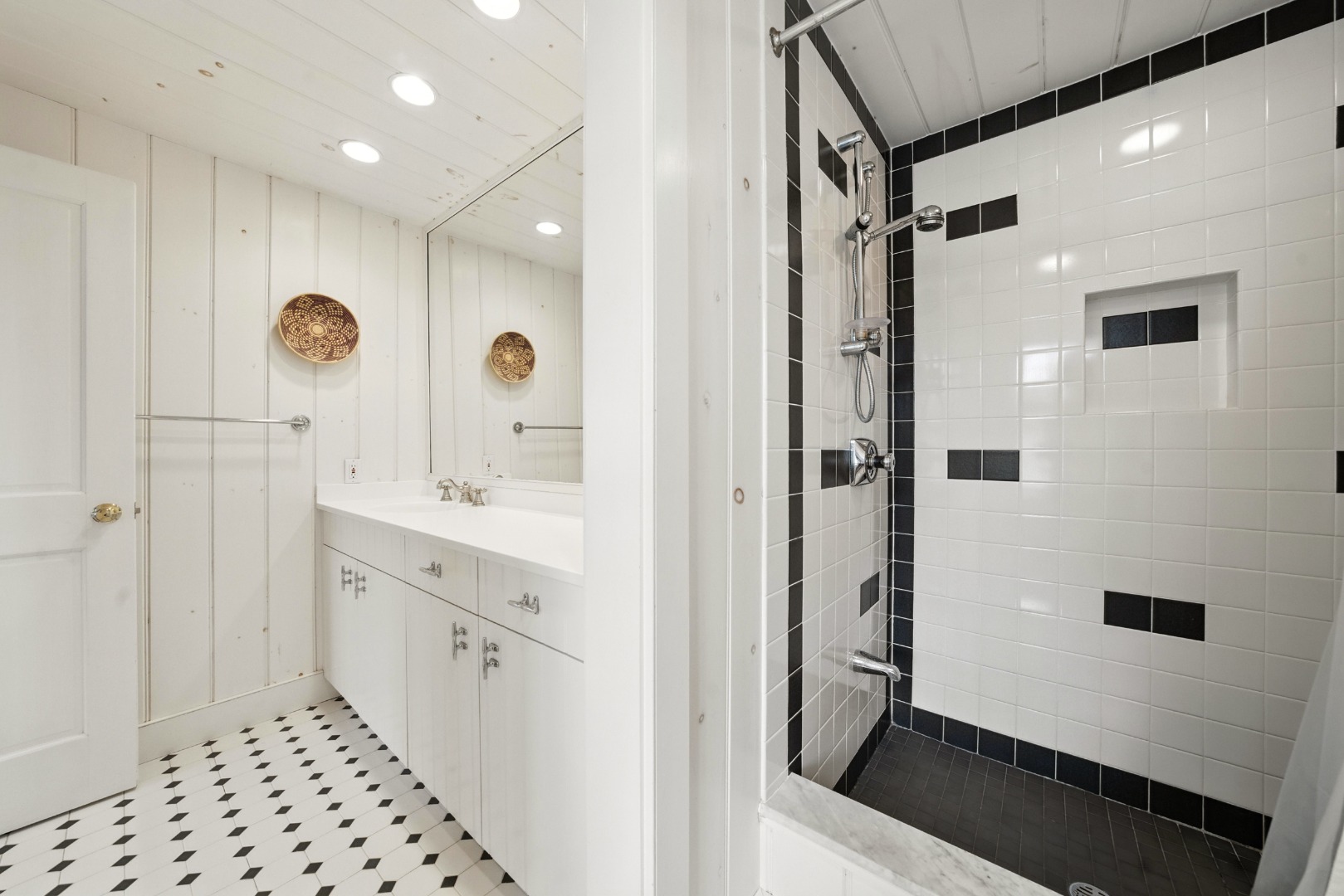 1 Little Neck Way, Unit 1 Nantucket, MA 02554 - Photo 49 of 99 a bathroom with a double vanity sink a mirror a shower and a mirror