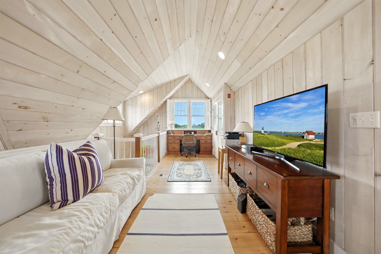 1 Little Neck Way, Unit 1 Nantucket, MA 02554 - Photo 67 of 99 a living room with a couch and a flat screen tv