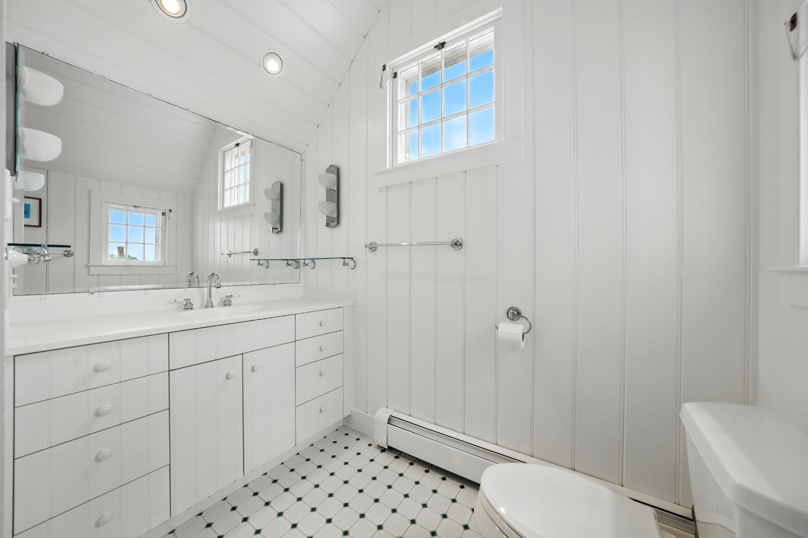 1 Little Neck Way, Unit 1 Nantucket, MA 02554 - Photo 75 of 99 a spacious bathroom with a sink a toilet a shower and a mirror