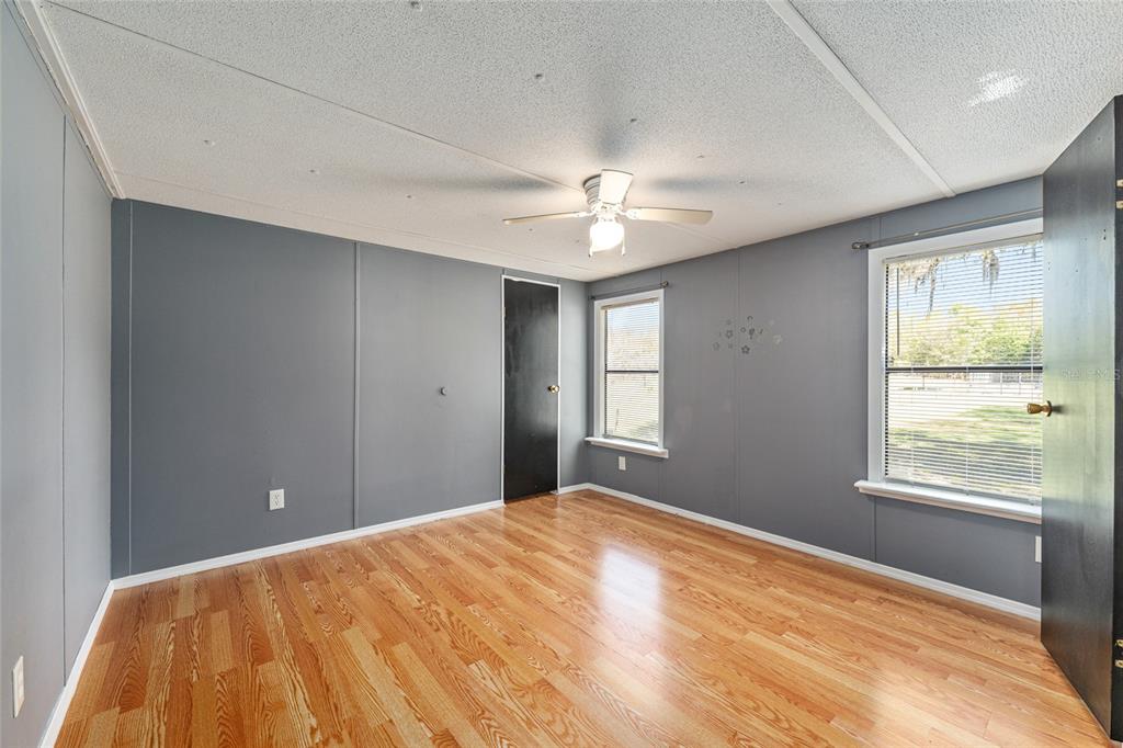 5600 Southeast 39th Street Trenton, FL 32693 - Photo 31 of 73 a bedroom with a bed and a window