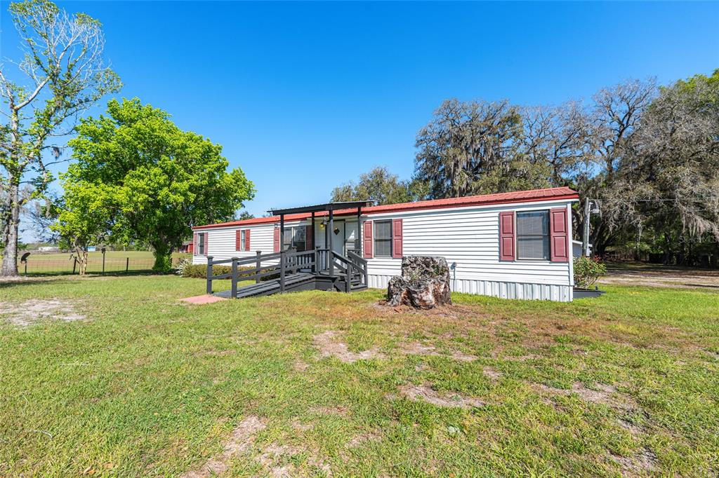 5600 Southeast 39th Street Trenton, FL 32693 - Photo 42 of 73 a view of a house with a yard