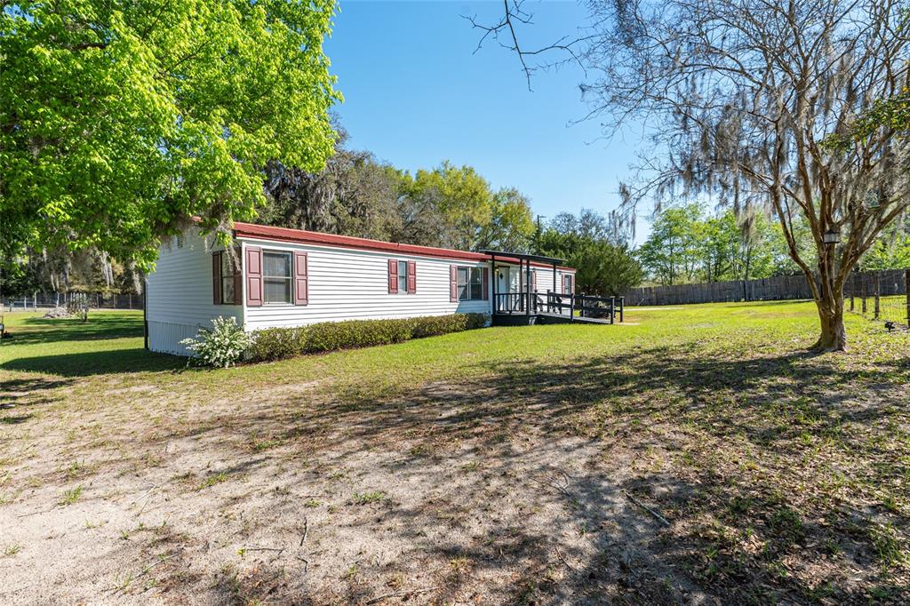 5600 Southeast 39th Street Trenton, FL 32693 - Photo 46 of 73 a house view with a garden space