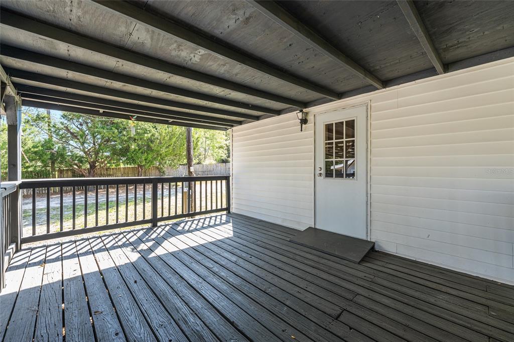 5600 Southeast 39th Street Trenton, FL 32693 - Photo 54 of 73 a view of wooden balcony