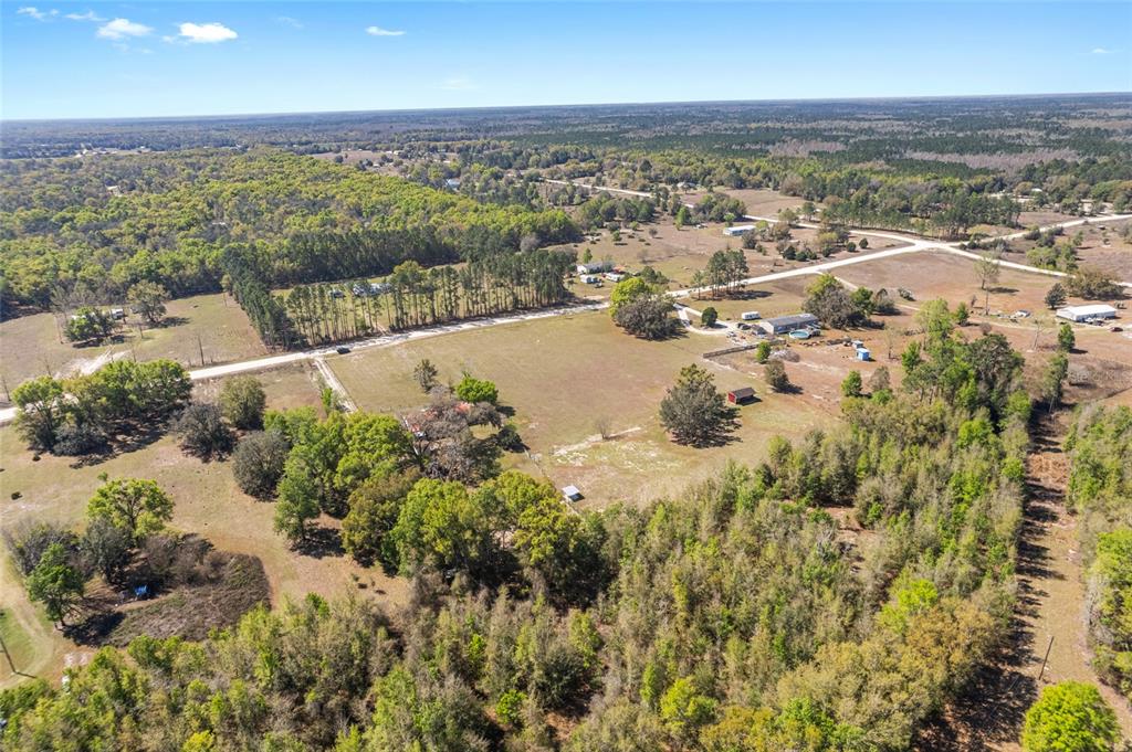 5600 Southeast 39th Street Trenton, FL 32693 - Photo 67 of 73 an aerial view of residential houses with outdoor space