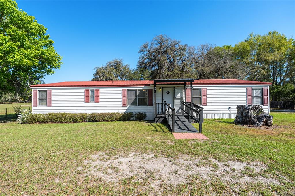 5600 Southeast 39th Street Trenton, FL 32693 - Photo 73 of 73 a view of a house with back yard