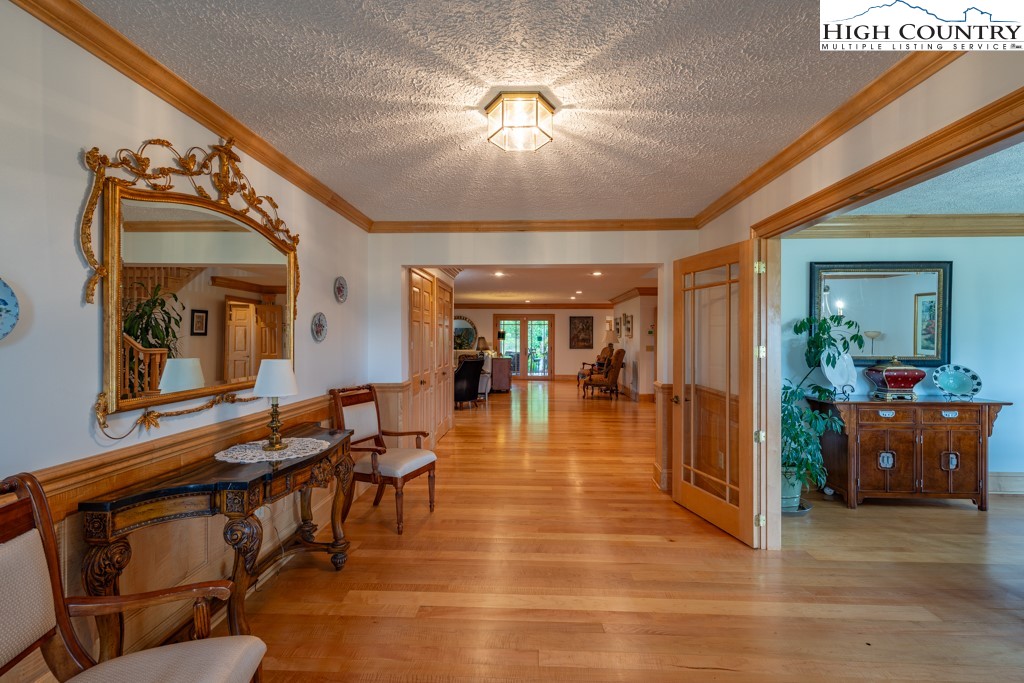 6985 Junaluska Road Boone, NC 28607 - Photo 13 of 49 a view of a lobby with furniture and chandelier
