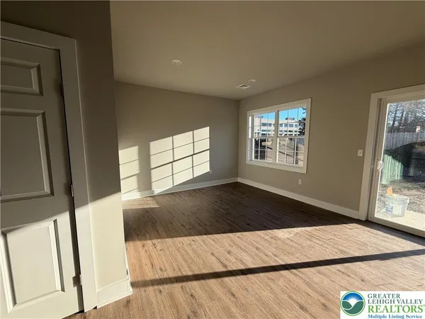 a view of an empty room and window