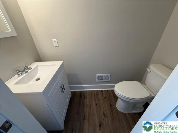 a bathroom with a sink and a toilet