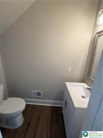a bathroom with a sink and a toilet