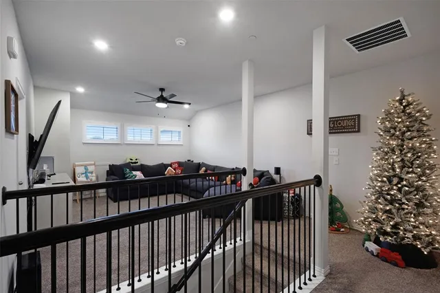 a view of a house with backyard and porch