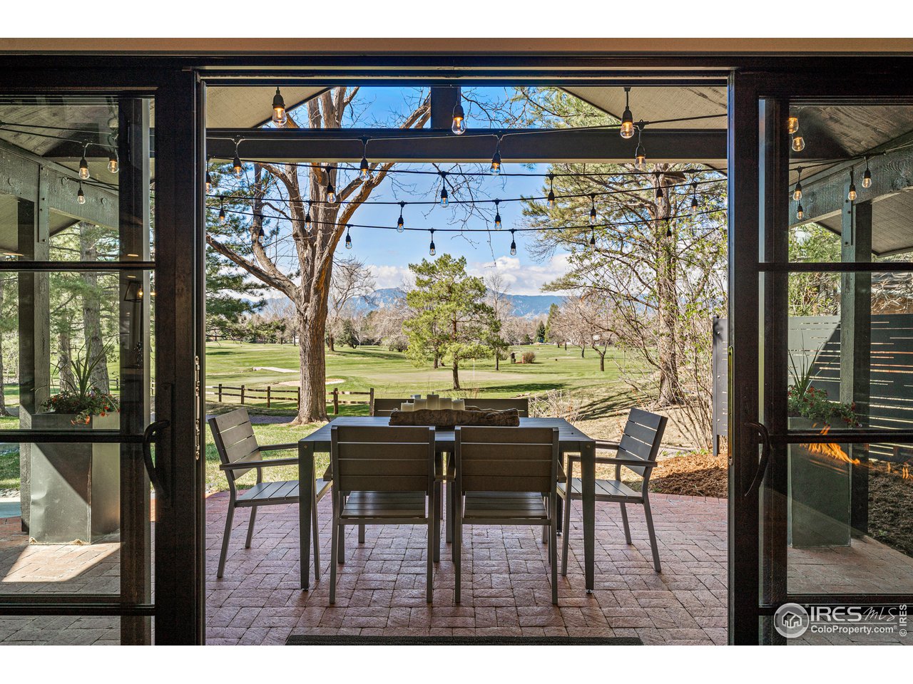 7126 Four Rivers Road Boulder, CO 80301 - Photo 25 of 38 a view of a chairs and table in a balcony