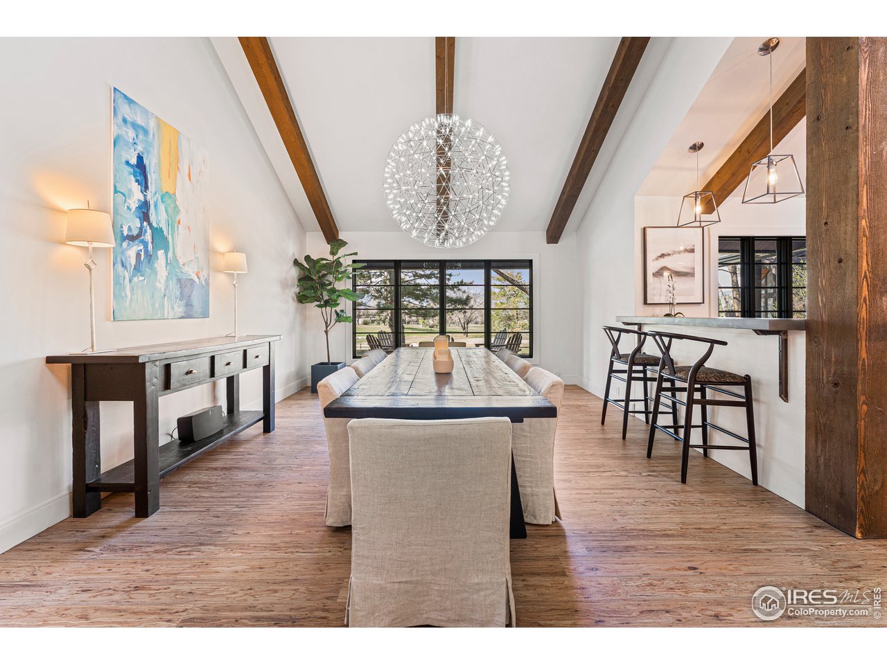 7126 Four Rivers Road Boulder, CO 80301 - Photo 5 of 38 a view of a dining room with furniture and window