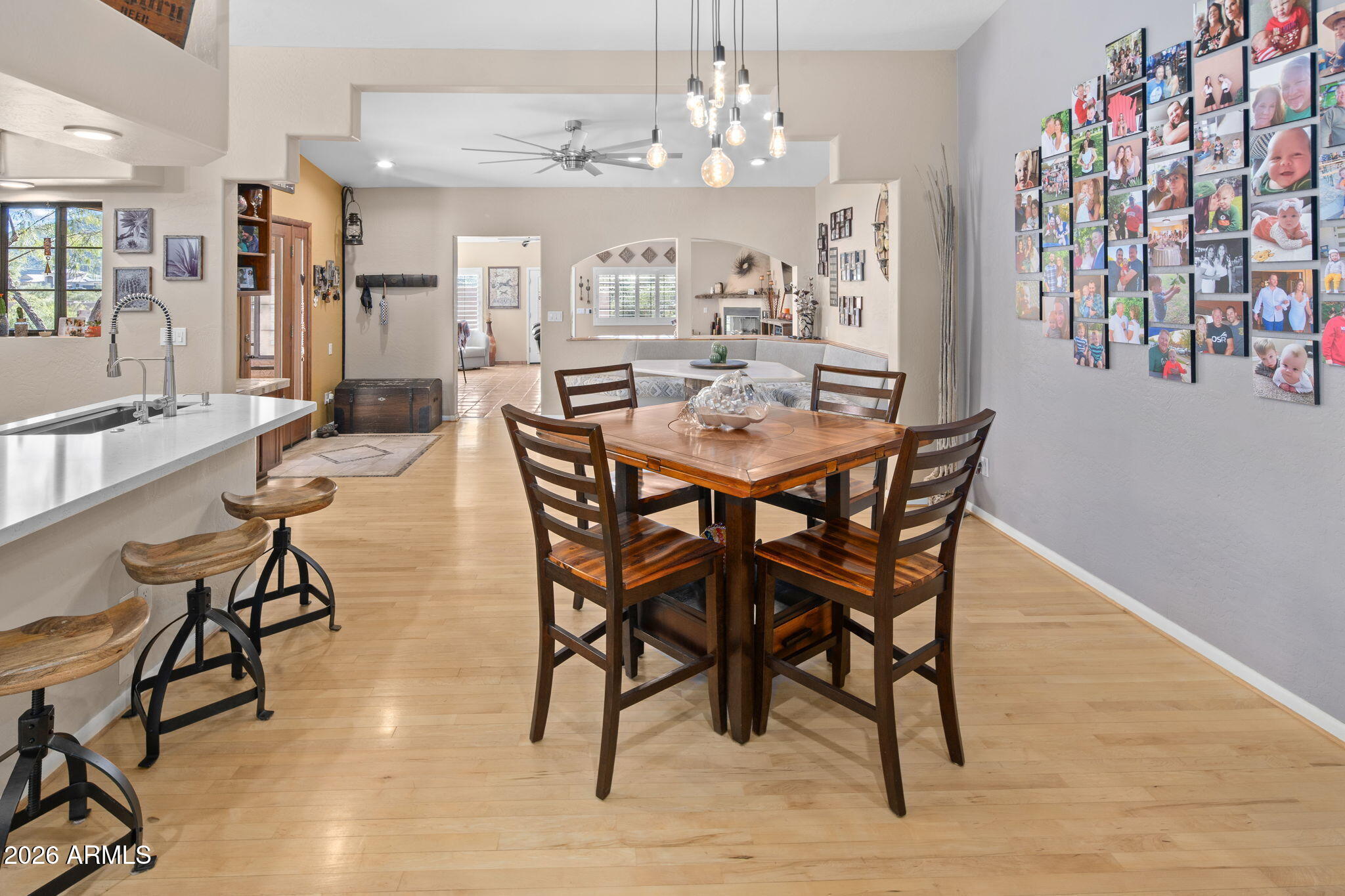 42331 North 3rd Street Phoenix, AZ 85086 - Photo 14 of 52 a view of a dining room with furniture and a chandelier