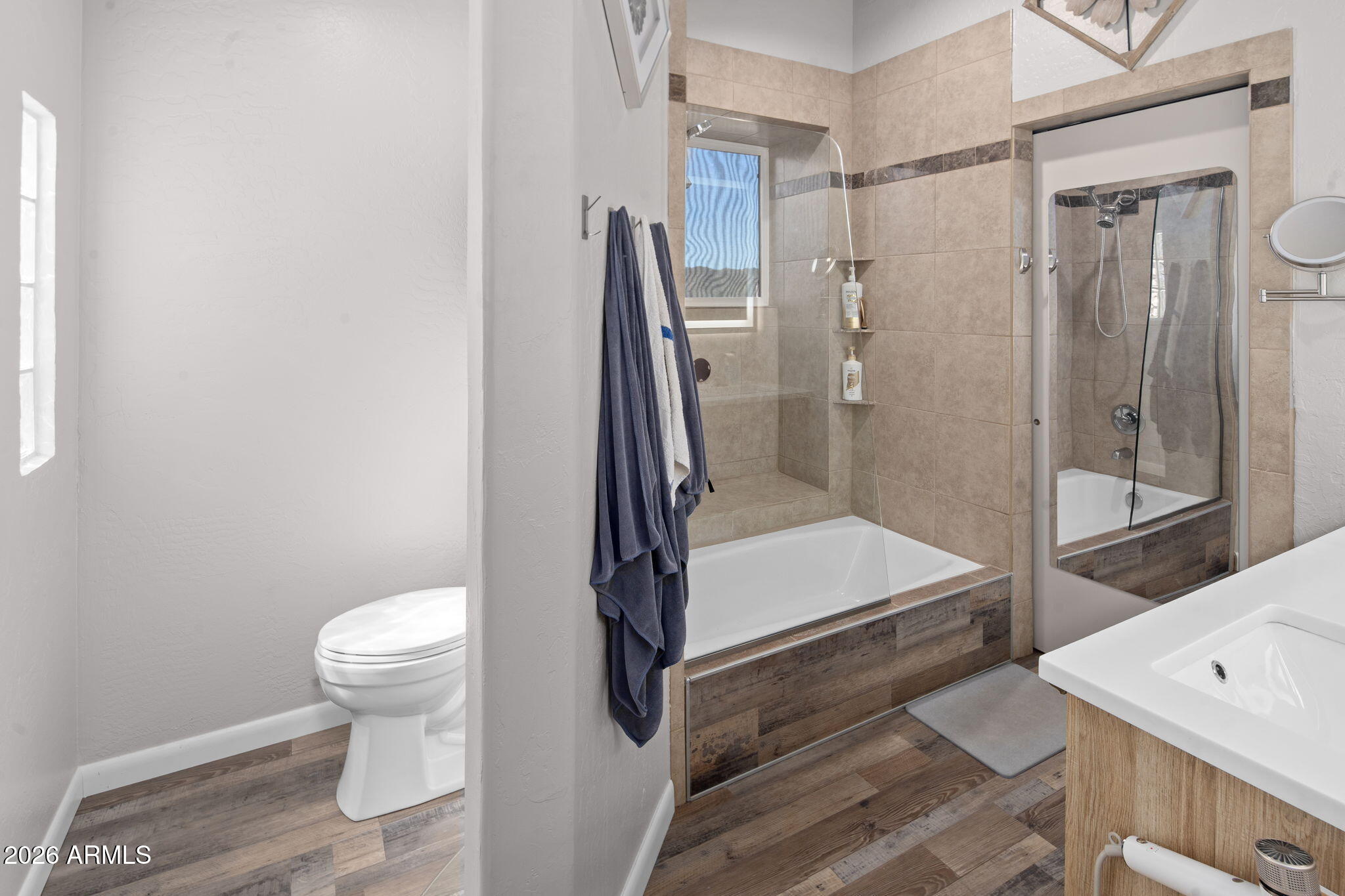 42331 North 3rd Street Phoenix, AZ 85086 - Photo 24 of 52 a bathroom with a shower and a toilet